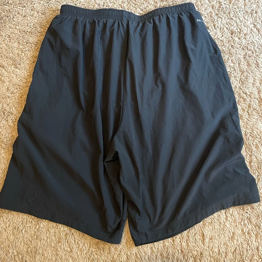 Nike Dri—Fit Men's Athletic Shorts in Black with Green Stripes